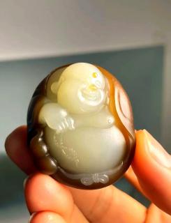 和田玉弥勒佛雕:文化,艺术与佛哲学的交响